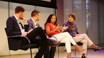 Jemele Hill, speaking on stage with Michael Shiffman, Nate Ravitz, and Daniel Roberts at a 2017 spor...