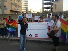 Gays in Lebanon protesting with pride flags and banners