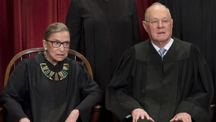 Anthony M. Kennedy and Ruth Bader Ginsburg sitting in next to each other in court attire 