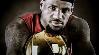 Full-profiled LeBron James with a trophy