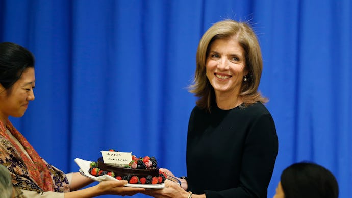 Caroline Kennedy as the first female U.S. ambassador to Japan receiving a welcome gift