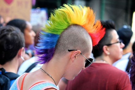 A trans woman that identifies as a lesbian with a multicolored mohawk