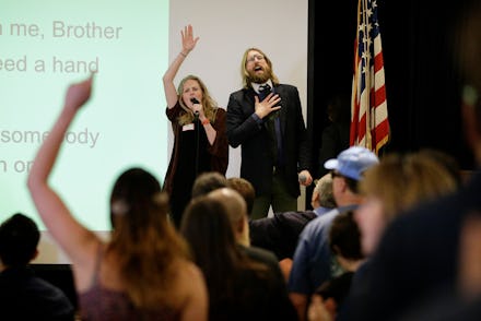 People gathered in the Atheist Church