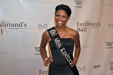 Former Miss Kentucky winner Djuan Keila Trent, in a strapless black dress and her "Miss Kentucky" sa...