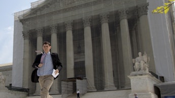 A man walking out of the SCOTUS building