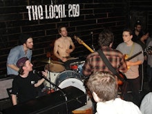 Tom Barnes drumming and jamming with others at the local 269