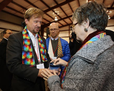 Reverend Frank Schaefer who officiated his gay son's wedding talking to another reverend 