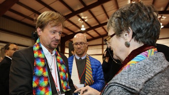 Reverend Frank Schaefer who officiated his gay son's wedding talking to another reverend 