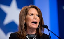 Michele Bachmann speaking about LGBT people into a microphone