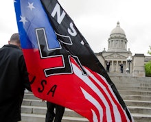 A hybrid USA, KKK and nazi flag.