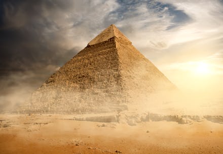 Historical documentary with a pyramid in the desert during the day