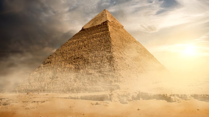 Historical documentary with a pyramid in the desert during the day