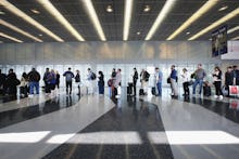 A queue of people that overbooked a flight