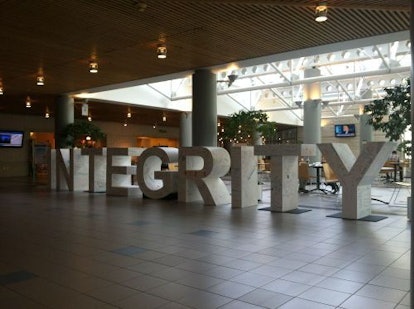 Inside of a building with giant INTEGRITY letters