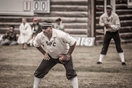 A man in a 19th century-inspired baseball uniform playing in the Gold Rush Days tournament