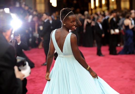 Lupita Nyong'o on the red carpet at the Oscars