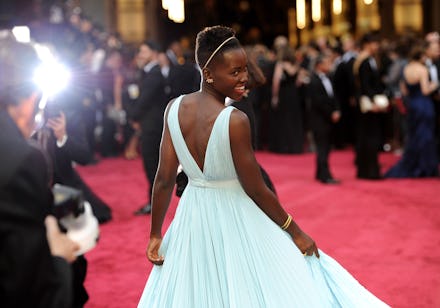 Lupita Nyong'o on the red carpet at the Oscars