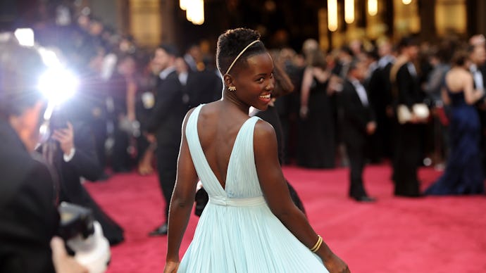 Lupita Nyong'o on the red carpet at the Oscars