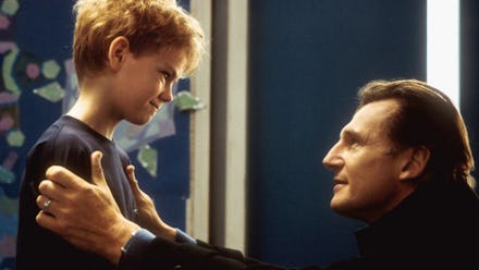 Liam Neeson talking to Thomas Brodie-Sangster in Love Actually