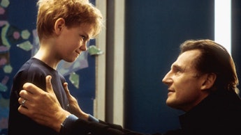Liam Neeson talking to Thomas Brodie-Sangster  in Love Actually