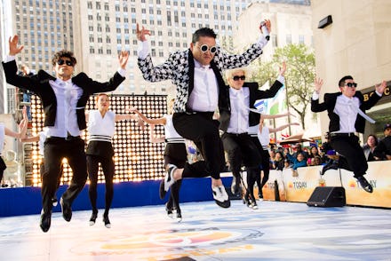 Psy performing on stage for the YouTube Music Awards