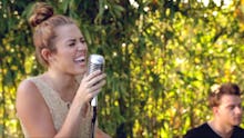 Miley Cyrus singing during the Backyard Sessions in 2012