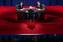 Mitt Romney sitting with two men in a TV show and talking about Obamacare