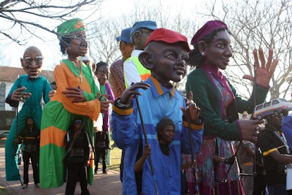 Large puppets used in performance at Grahamstown Arts Festival
