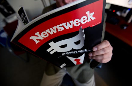 A man holding the newsweek after a harassment investigation has taken place