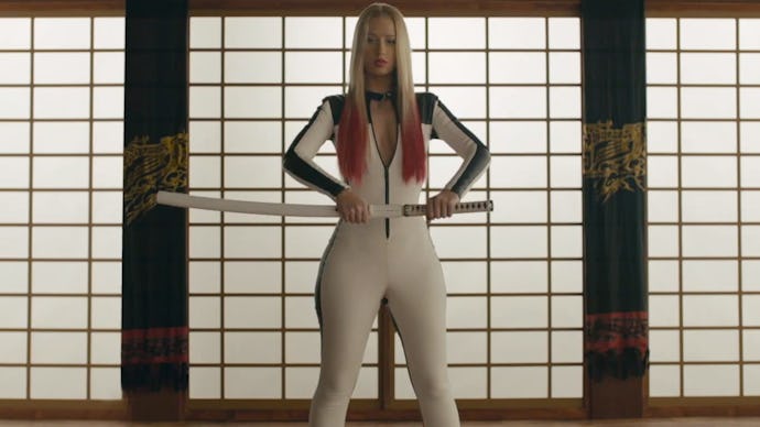 Iggy Azalea with a sword in her music video with various tributes to Quentin Tarantino