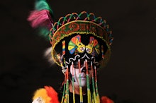 Artist Luis Castillo posing in his Day of the Dead costume on Halloween  