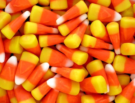 A close up shot of a pile of candy corn