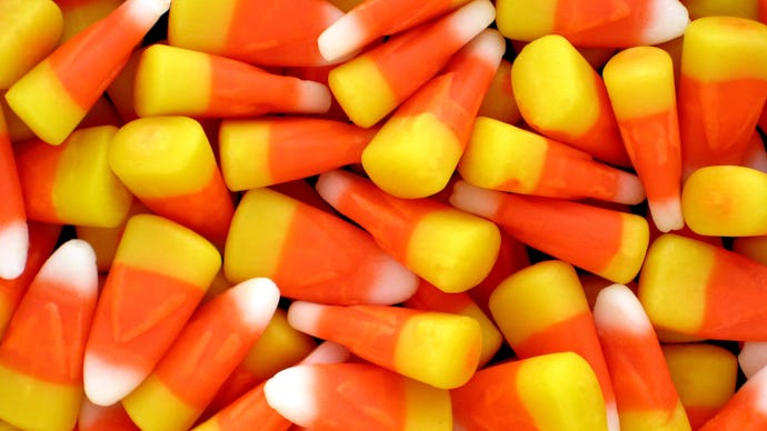 A close up shot of a pile of candy corn