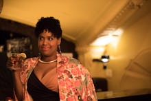 Natasha Rothwell holding a drink in Insecure