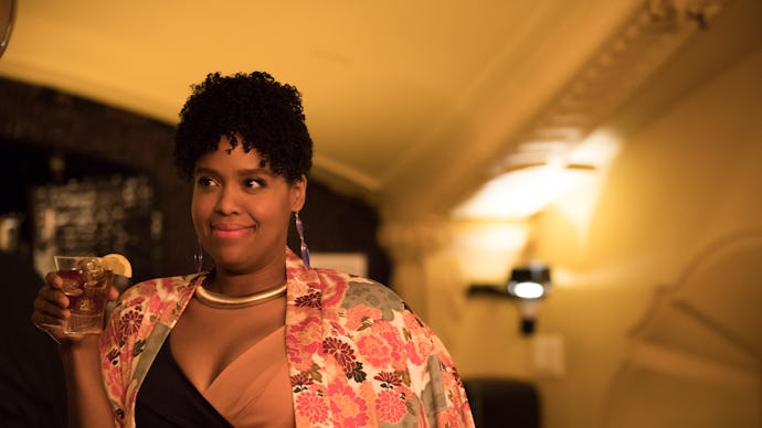 Natasha Rothwell holding a drink in Insecure