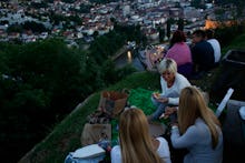 People eating their iftar meal outside and together during Ramadan