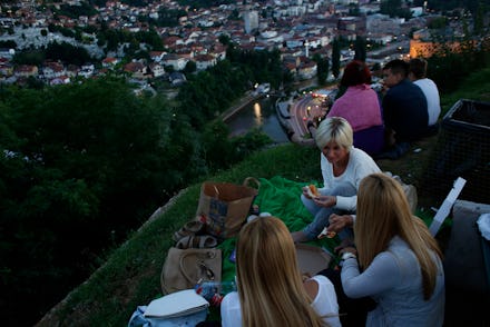 People eating their iftar meal outside and together during Ramadan