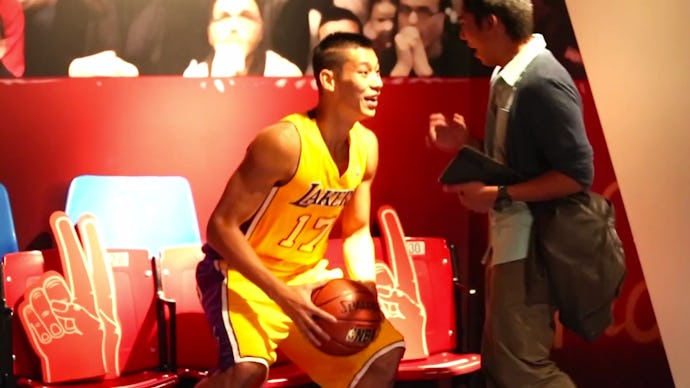 Jeremy Lin during a basketball game holding a basketball