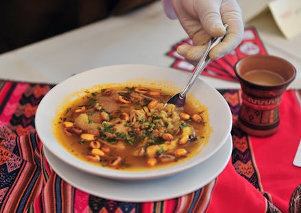 A plate of Peruvian national caldo soup