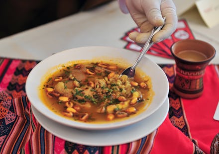 A plate of Peruvian national caldo soup