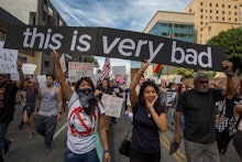 Muslim population in US protesting with a big "this is very bad" banner