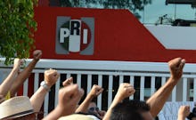 Protesters marching against the President of Mexico