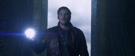 A character from 'Guardians of the Galaxy' standing alone in dark