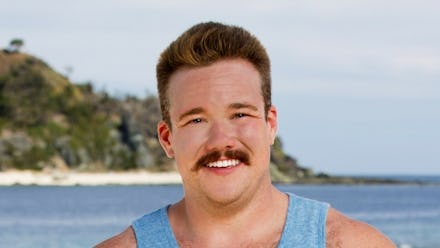 Zeke Smith smiling on the set of survivor