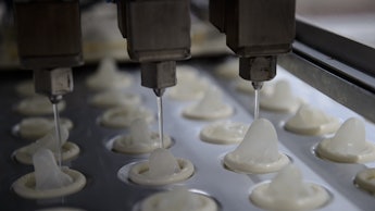 A machine making condoms