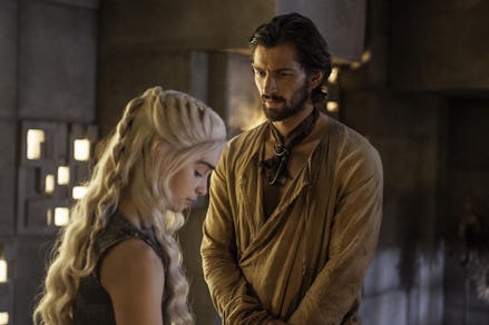 Daario Naharis and Khaleesi, Game of Thrones characters, standing in a room, talking, with Khaleesi ...