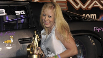  Lynsi Torres in a white top at an award show
