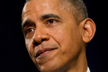 A closeup of Barack Obama looking into the distance