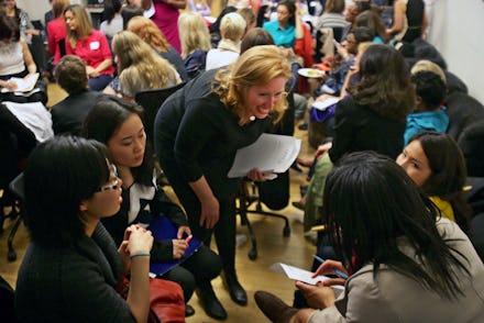 Employees of a bank sitting in a circle, talking