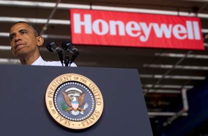 A Honeywell sign behind Barack Obama